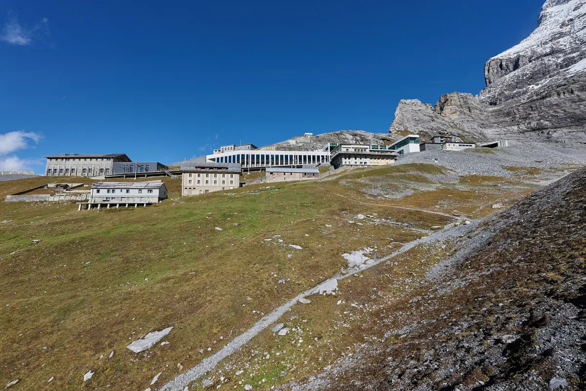 The buildings of Eigergletscher station below the Eiger